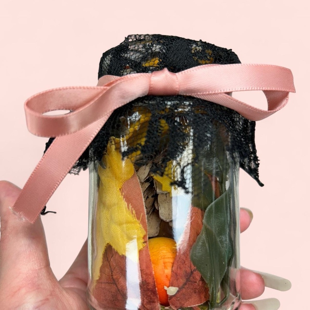 Decorative Autumn-Themed Jar with Pink Ribbon